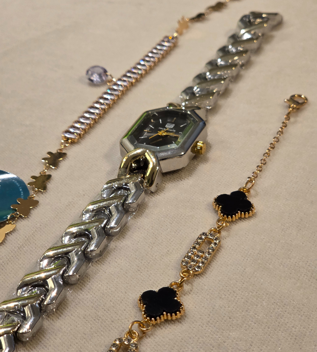 Watch with leaf clover motif bracelet + waterway stone chain with teardrop charm