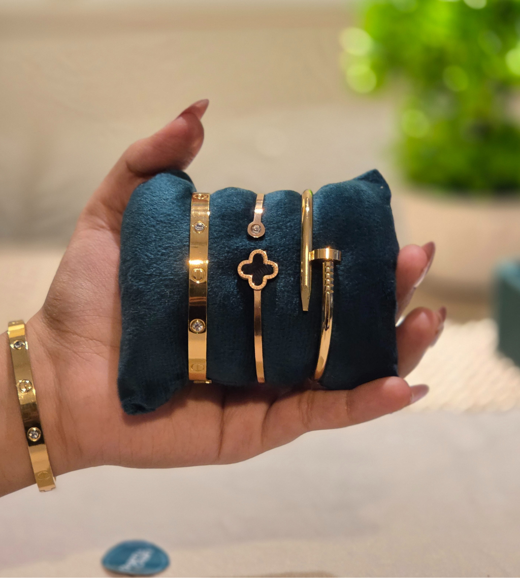 Trio Stack of Cartier Love & Nail Bangle With Black Clover Bangle