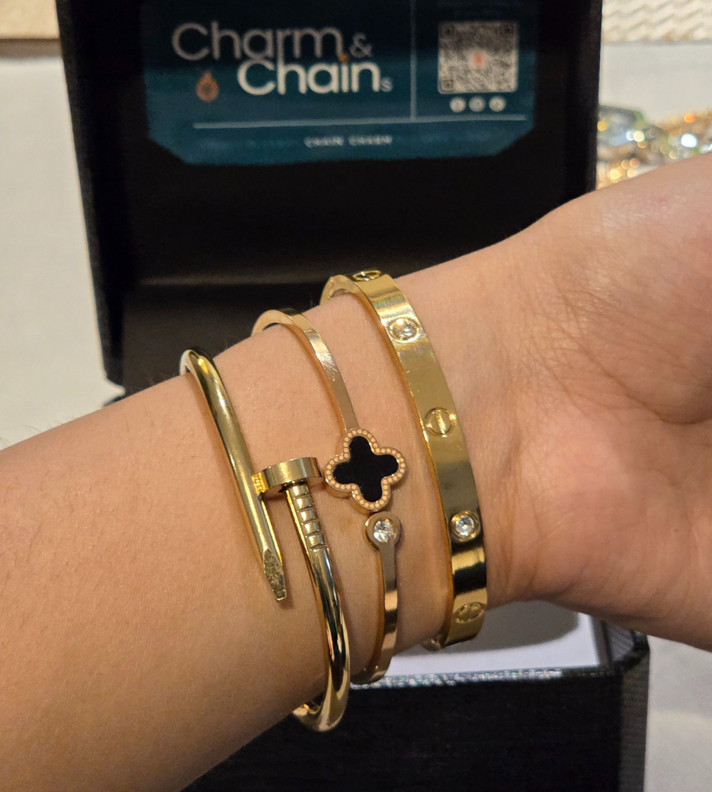 Trio Stack of Cartier Love & Nail Bangle With Black Clover Bangle