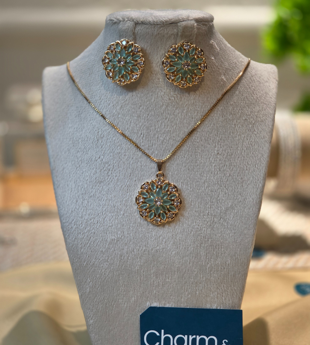 Gold-Plated Floral Pendant and Earring Set (Stone Color= Emerald)